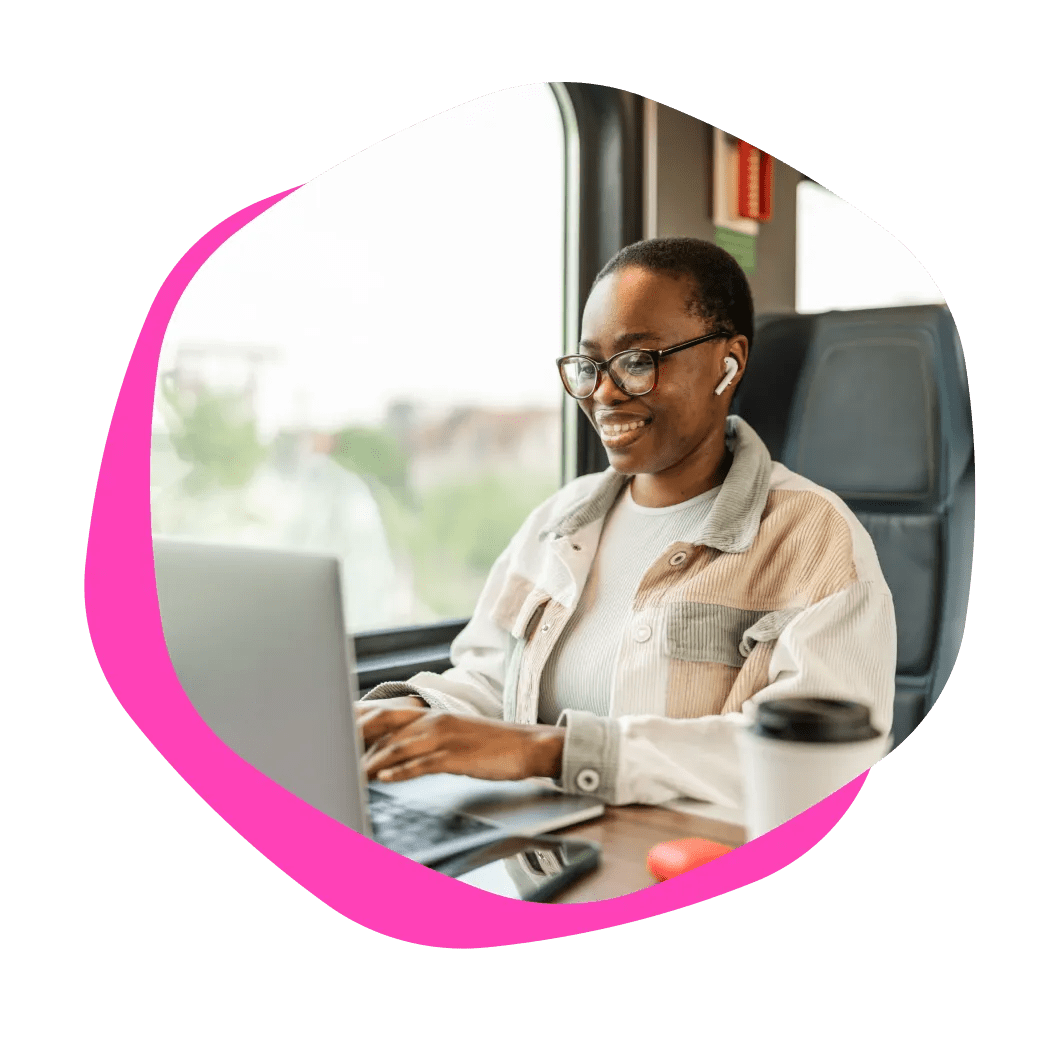 Woman with laptop on train