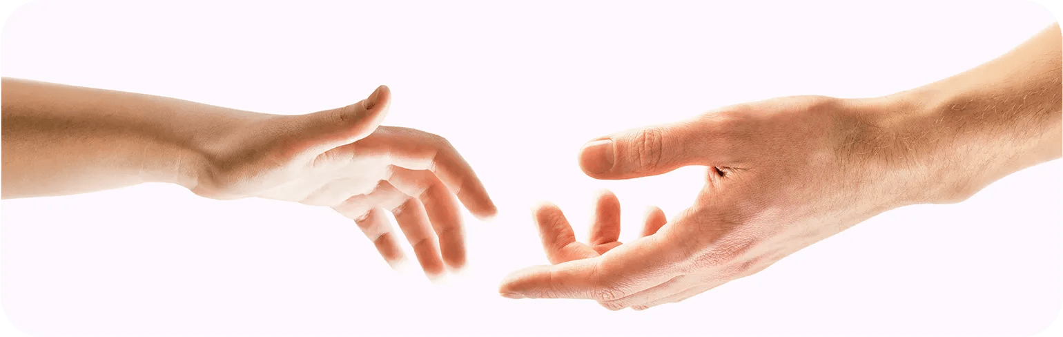 hands reaching out to touch each other