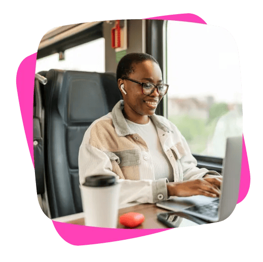 woman on a train using a laptop